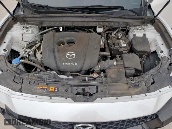 2023 Mazda CX-50 S Premium Plus with VIN 7MMVABEM3PN131818, listed as a Copart auction lot 57358595 with 61,179 mi miles and Clean title. Bid and sale history available at DreamBid. Image 12.