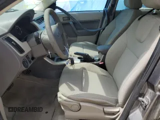 2009 Ford Focus S with VIN 1FAHP34N79W178011, listed as a Copart auction lot 51120195 with 123,930 mi miles and Salvage Title. Bid and sale history available at carsss.com. Image 7.