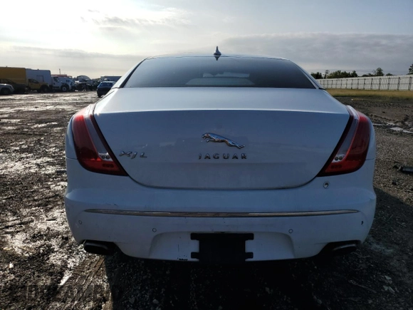 2014 Jaguar XJ Portfolio with VIN SAJWA2GZ3E8V60788, listed as a Copart auction lot 43272405 with 97,196 mi miles and Salvage title. Bid and sale history available at DreamBid. Image 6.