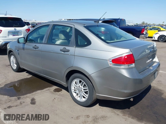 2008 Ford Focus SE with VIN 1FAHP35N68W154490, listed as a IAAI auction lot 42128643 with 141,316 mi miles. Bid and sale history available at carsss.com. Image 3.