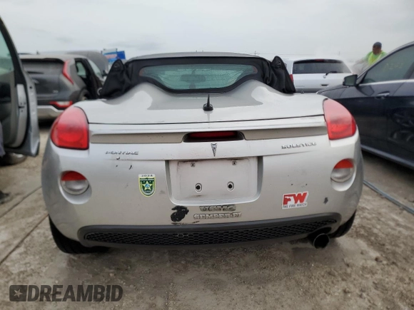 2009 Pontiac Solstice z VIN 1G2MN35B59Y107109, wystawiony jako Copart lot #76083734 z przebiegiem Nie podano mil oraz Nie do naprawy • Non repairable. Historia ofert i sprzedaży dostępna na DreamBid. Obrazek 6.