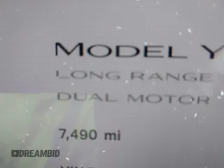 2024 Tesla Model Y Long Range with VIN 7SAYGDEE5RA241433, listed as a IAAI auction lot 41569277 with 7,490 mi miles. Bid and sale history available at carsss.com. Image 14.