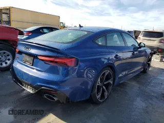 2023 Audi RS 5 Sportback z VIN WUAAWCF54PA903752, wystawiony jako Copart lot #40446644 z przebiegiem 9 820 mil mil oraz . Historia ofert i sprzedaży dostępna na DreamBid. Obrazek 3.