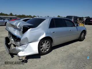 2010 Cadillac DTS 1SA z VIN 1G6KA5EYXAU100721, wystawiony jako Copart lot #69624144 z przebiegiem 175 627 mil mil oraz Szkoda całkowita • Salvage title. Historia ofert i sprzedaży dostępna na DreamBid. Obrazek 3.