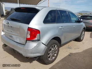 2013 Ford Edge SEL with VIN 2FMDK4JC2DBE33878, listed as a IAAI auction lot 41597848 with 216,761 mi miles. Bid and sale history available at carsss.com. Image 4.