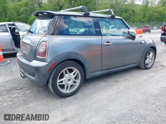 2009 MINI Hardtop S with VIN WMWMF73549TX41034, listed as a IAAI auction lot 42210662 with 108,118 mi miles and . Bid and sale history available at DreamBid. Image 4.
