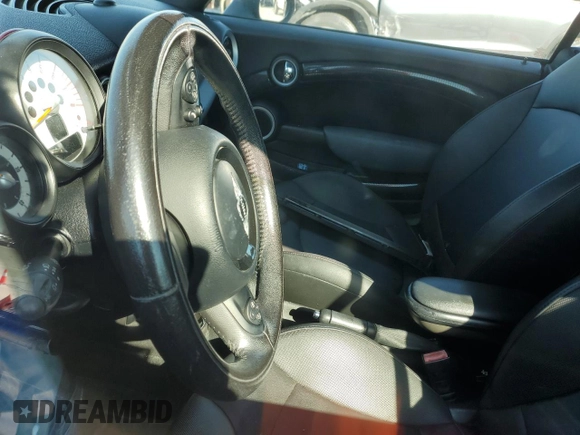 2012 MINI Convertible S with VIN WMWZP3C58CT296381, listed as a Copart auction lot 50834655 with 111,228 mi miles and Salvage Title. Bid and sale history available at DreamBid. Image 8.