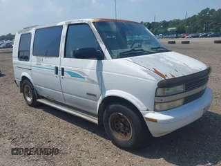 1995 Chevrolet Astro Cargo z VIN 1GBDM19W5SB140124, wystawiony jako IAAI lot #42668423 z przebiegiem 127 249 mil mil oraz . Historia ofert i sprzedaży dostępna na DreamBid. Obrazek 1.