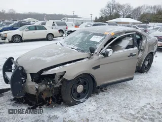 2014 Ford Police Interceptor with VIN 1FAHP2MK3EG107151, listed as a IAAI auction lot 41599383 with 174,210 mi miles and . Bid and sale history available at DreamBid. Image 6.