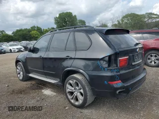 2012 BMW X5 50i with VIN 5UXZV8C51CL424965, listed as a Copart auction lot 64414455 with 121,894 mi miles and Clean title. Bid and sale history available at DreamBid. Image 2.