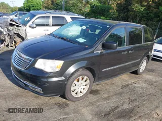 2014 Chrysler Town & Country Touring with VIN 2C4RC1BG1ER453684, listed as a IAAI auction lot 42111596 with 115,572 mi miles. Bid and sale history available at carsss.com. Image 2.