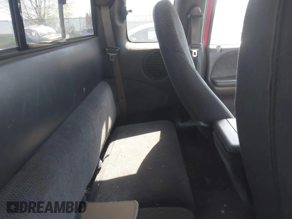 1999 Dodge Dakota SLT z VIN 1B7GL22X2XS222162, wystawiony jako IAAI lot #42038943 z przebiegiem 222 883 mil mil oraz . Historia ofert i sprzedaży dostępna na DreamBid. Obrazek 8.