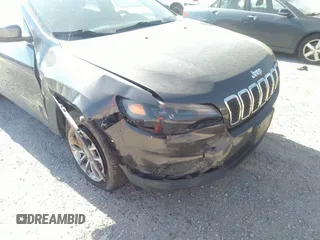 2019 Jeep Cherokee Latitude Plus with VIN 1C4PJMLX9KD413915, listed as a IAAI auction lot 41747608 with 50,390 mi miles and . Bid and sale history available at DreamBid. Image 6.