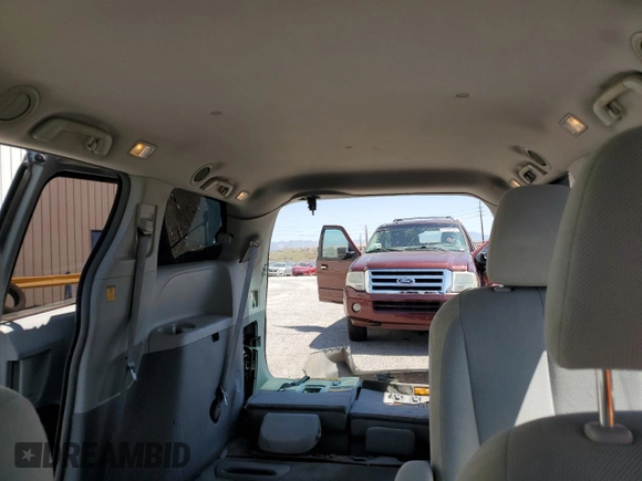 2012 Toyota Sienna with VIN 5TDZK3DC8CS246285, listed as a Copart auction lot 61676185 with 114,700 mi miles and Salvage title. Bid and sale history available at DreamBid. Image 10.