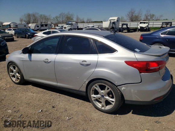 2015 Ford Focus Titanium with VIN 1FADP3J2XFL334046, listed as a Copart auction lot 48538825 with 98,322 mi miles and Non Repairable. Bid and sale history available at carsss.com. Image 2.