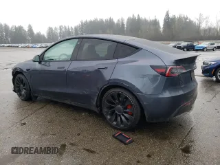 2022 Tesla Model Y Performance with VIN 7SAYGDEF2NF459268, listed as a Copart auction lot 45764735 with 64,421 mi miles and Salvage title. Bid and sale history available at DreamBid. Image 2.