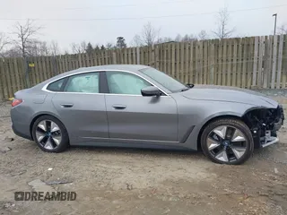 2024 BMW i4 eDrive35 z VIN WBY43AW05RFT22034, wystawiony jako IAAI lot #41545162 z przebiegiem 1499 mil mil oraz . Historia ofert i sprzedaży dostępna na DreamBid. Obrazek 13.