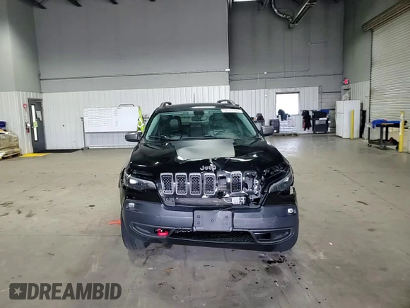 2020 Jeep Cherokee Trailhawk with VIN 1C4PJMBX2LD638678, listed as a Copart auction lot 52197785 with 103,724 mi miles and Salvage title. Bid and sale history available at DreamBid. Image 11.