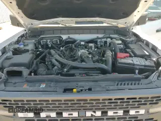 2023 Ford Bronco z VIN 1FMEE5DP2PLB39031, wystawiony jako Copart lot #69003025 z przebiegiem 32 738 mil mil oraz Szkoda całkowita • Salvage title. Historia ofert i sprzedaży dostępna na DreamBid. Obrazek 14.