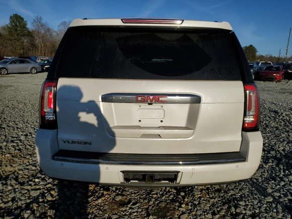 2016 GMC Yukon Denali with VIN 1GKS2CKJ9GR409800, listed as a Copart auction lot 44707915 with 161,114 mi miles and Salvage Title. Bid and sale history available at carsss.com. Image 6.