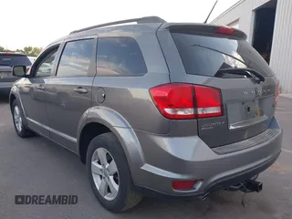 2012 Dodge Journey SXT with VIN 3C4PDDBG2CT333537, listed as a IAAI auction lot 42556329 with 172,834 mi miles and . Bid and sale history available at DreamBid. Image 3.