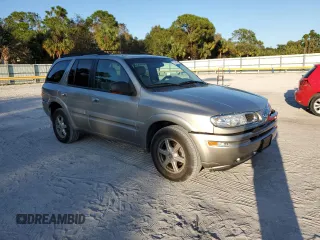 2002 Oldsmobile Bravada z VIN 1GHDT13S022195272, wystawiony jako Copart lot #77302614 z przebiegiem 115 800 mil mil oraz Szkody całkowita. Historia ofert i sprzedaży dostępna na DreamBid. Obrazek 4.