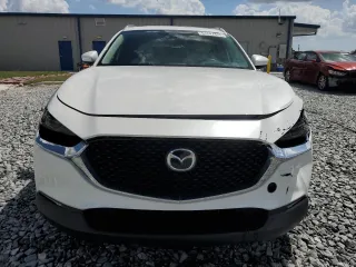 2021 Mazda CX-30 Premium z VIN 3MVDMADM5MM228747, wystawiony jako Copart lot #51747475 z przebiegiem 13 562 mil mil oraz Nie do naprawy • Non repairable. Historia ofert i sprzedaży dostępna na DreamBid. Obrazek 5.
