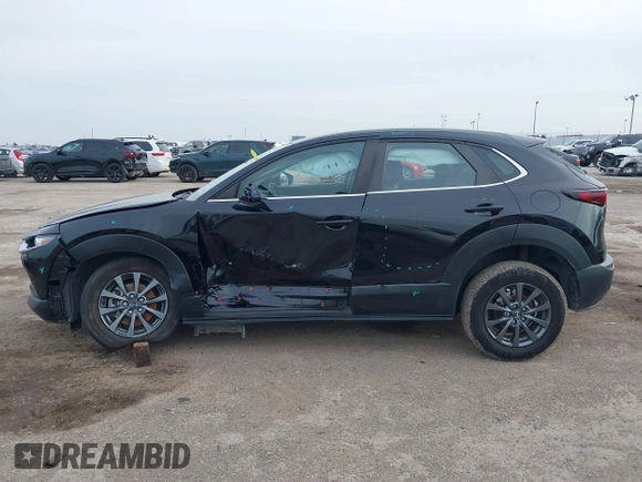 2021 Mazda CX-30 2.5 S with VIN 3MVDMAAL2MM303321, listed as a IAAI auction lot 41583346 with 57,122 mi miles. Bid and sale history available at carsss.com. Image 14.