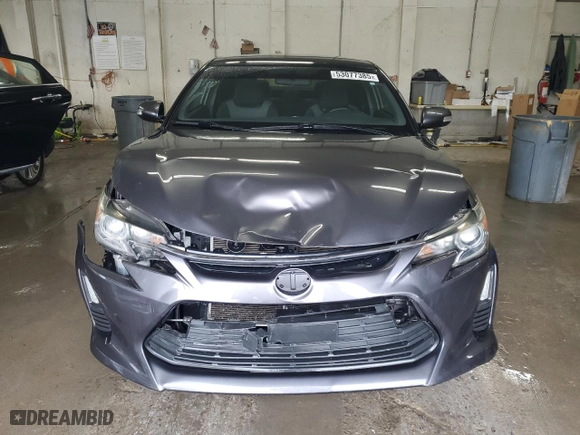 2015 Scion tC with VIN JTKJF5C70FJ002254, listed as a Copart auction lot 53077385 with 117,221 mi miles and Salvage Title. Bid and sale history available at carsss.com. Image 5.