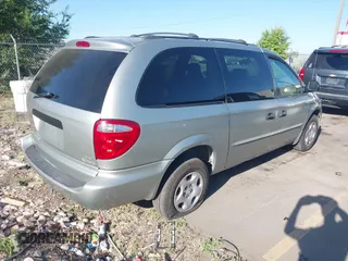 2003 Dodge Caravan SE with VIN 1D4GP24303B188329, listed as a IAAI auction lot 42532703 with 184,018 mi miles and . Bid and sale history available at DreamBid. Image 4.