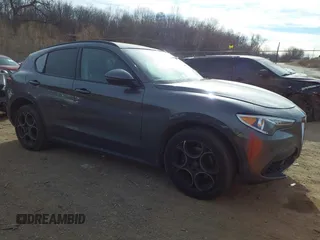 2018 Alfa Romeo Stelvio Sport z VIN ZASFAKPN5J7B64686, wystawiony jako IAAI lot #41264797 z przebiegiem 77 609 mil mil oraz . Historia ofert i sprzedaży dostępna na DreamBid. Obrazek 1.