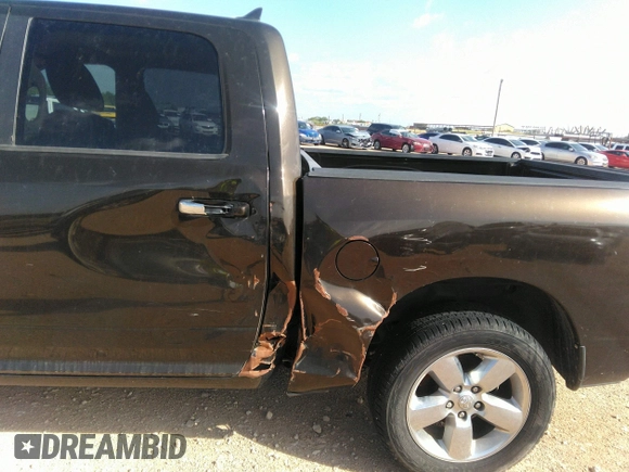2014 Ram 1500 Big Horn with VIN 1C6RR6LT7ES229297, listed as a IAAI auction lot 42387218 with 99,811 mi miles and . Bid and sale history available at DreamBid. Image 6.