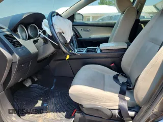 2015 Mazda CX-9 Sport с VIN JM3TB2BA5F0459548, выставлен на аукционе Copart как лот 60217845 с пробегом 152 486 миль миль и Чистый • Clean title. История ставок и продаж доступна на DreamBid. Изображение 7.