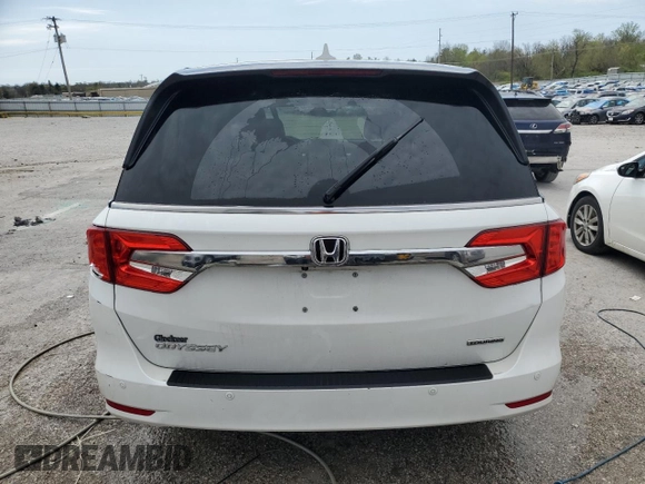 2020 Honda Odyssey Touring with VIN 5FNRL6H8XLB019365, listed as a Copart auction lot 52404335 with 59,486 mi miles and Salvage Title. Bid and sale history available at DreamBid. Image 6.