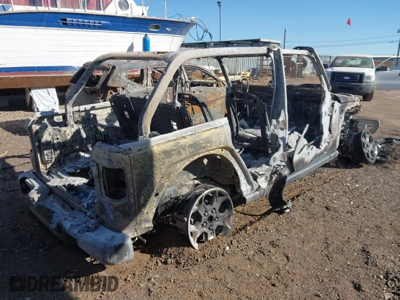 2023 Jeep Wrangler Rubicon with VIN 1C4JJXR63PW557655, listed as a IAAI auction lot 40857194 with Not provided miles and . Bid and sale history available at DreamBid. Image 4.