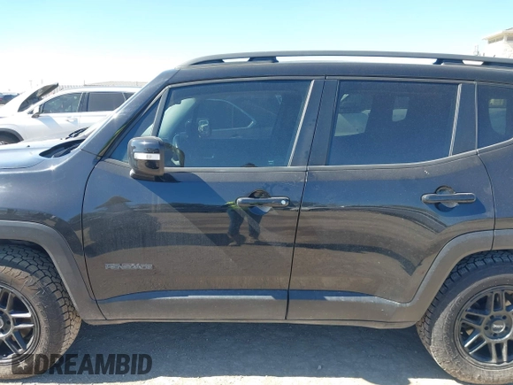 2016 Jeep Renegade Latitude with VIN ZACCJBBT1GPD65532, listed as a IAAI auction lot 41642242 with 124,608 mi miles. Bid and sale history available at carsss.com. Image 14.