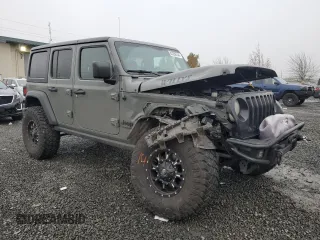 2022 Jeep Wrangler Unlimited Willys with VIN 1C4HJXDM1NW241284, listed as a Copart auction lot 83336744 with Not Provided miles and Salvage Title. Bid and sale history available at DreamBid. Image 4.