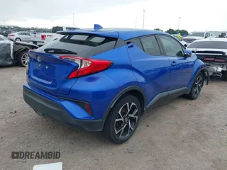 2020 Toyota C-HR LE with VIN JTNKHMBX7L1077218, listed as a IAAI auction lot 41994809 with 69,441 mi miles and . Bid and sale history available at DreamBid. Image 4.