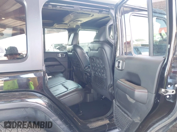 2019 Jeep Wrangler Unlimited Rubicon with VIN 1C4HJXFN5KW522991, listed as a IAAI auction lot 42609616 with 111,844 mi miles and . Bid and sale history available at DreamBid. Image 8.