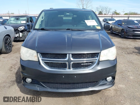 2011 Dodge Grand Caravan Crew with VIN 2D4RN5DG3BR660235, listed as a IAAI auction lot 41945522 with 148,924 mi miles and . Bid and sale history available at DreamBid. Image 12.