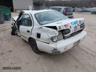 1997 Geo Prizm LSi with VIN 1Y1SK5266VZ417087, listed as a IAAI auction lot 42009913 with 198,041 mi miles. Bid and sale history available at carsss.com. Image 3.