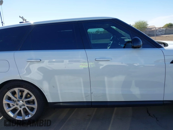 2024 Land Rover Range Rover Sport SE z VIN SAL1P9EU7RA414229, wystawiony jako IAAI lot #41885227 z przebiegiem 2 127 mil mil oraz . Historia ofert i sprzedaży dostępna na DreamBid. Obrazek 14.