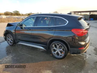 2018 BMW X1 xDrive28i with VIN WBXHT3C30J5K23793, listed as a Copart auction lot 42944555 with 72,250 mi miles and Salvage Title. Bid and sale history available at carsss.com. Image 2.