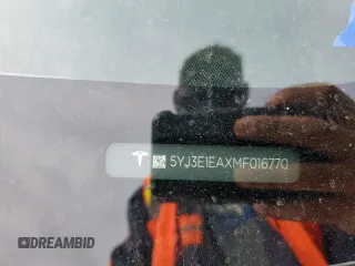 2021 Tesla Model 3 Standard Range Plus z VIN 5YJ3E1EAXMF016770, wystawiony jako Copart lot #55045515 z przebiegiem 38 585 mil mil oraz Szkoda całkowita • Salvage title. Historia ofert i sprzedaży dostępna na DreamBid. Obrazek 13.