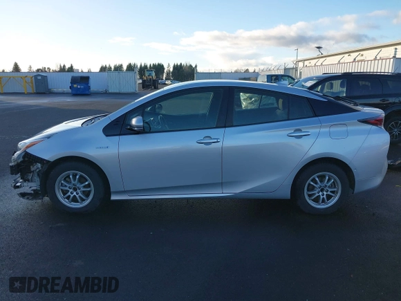 2018 Toyota Prius Two with VIN JTDKARFU8J3547408, listed as a IAAI auction lot 41313198 with 76,060 mi miles. Bid and sale history available at carsss.com. Image 15.