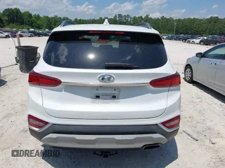 2019 Hyundai Santa Fe Limited z VIN 5NMS5CAA1KH136238, wystawiony jako IAAI lot #42314285 z przebiegiem 74 606 mil mil oraz . Historia ofert i sprzedaży dostępna na DreamBid. Obrazek 16.
