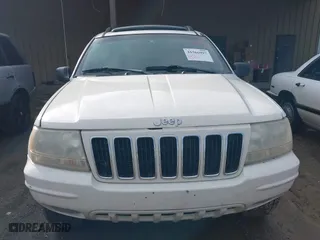 2003 Jeep Grand Cherokee Limited with VIN 1J4GW58N63C505919, listed as a IAAI auction lot 41566997 with 233,827 mi miles. Bid and sale history available at carsss.com. Image 6.
