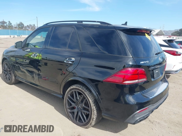 2016 Mercedes-Benz GLE 63 S AMG with VIN 4JGDA7FBXGA665133, listed as a IAAI auction lot 41634945 with 105,800 mi miles and . Bid and sale history available at DreamBid. Image 3.