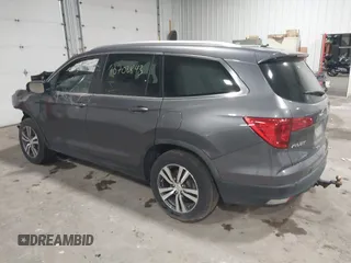 2017 Honda Pilot EX-L with VIN 5FNYF6H51HB080796, listed as a IAAI auction lot 40702843 with Not Provided miles and . Bid and sale history available at DreamBid. Image 3.