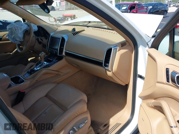 2014 Porsche Cayenne with VIN WP1AA2A20ELA02638, listed as a IAAI auction lot 42349570 with 113,355 mi miles and . Bid and sale history available at DreamBid. Image 5.